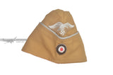 The embroidered insignia and braid on the LW Officer's tropical side cap