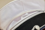 detail of the removable white top, which exposes the lining on the inside