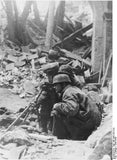 Fallschirmjager at Monte Cassino wearing Splinter-B helmet covers